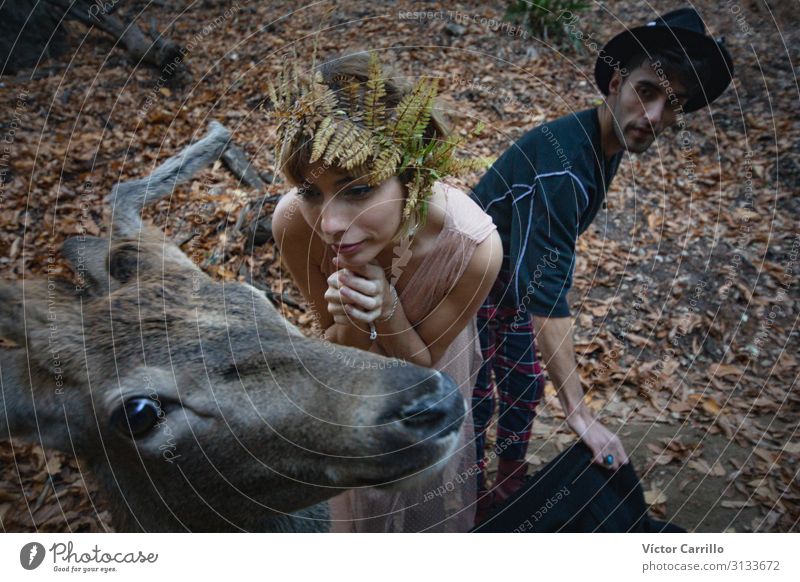 A young blonde boho woman and a young man with a deer Lifestyle Elegant Style Exotic Human being Masculine Feminine Young woman Youth (Young adults) Young man