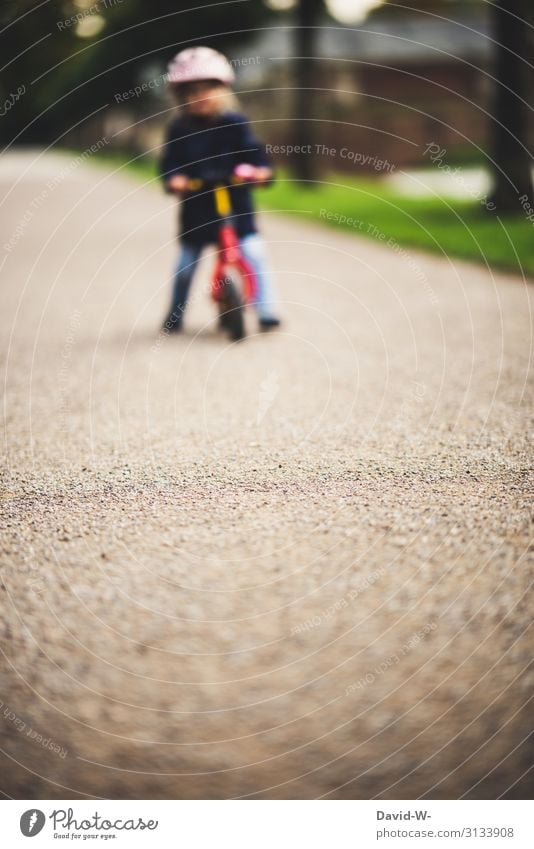 Toddler rides a bike Cycling Child Bicycle Driving Street Helmet Infancy out