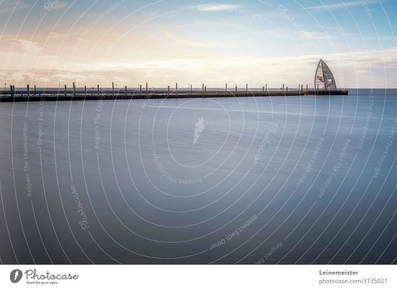 Sea mark of Juist at the entrance to the harbor Juist island Landmark Navigation mark Sea bridge East frisian island Island North Sea Long exposure Abstract