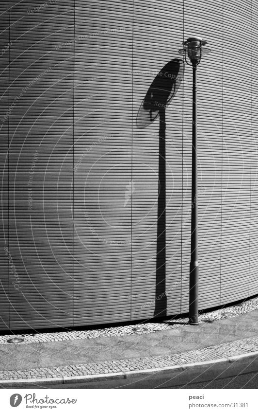 Lonely lantern Lantern Loneliness Gloomy Street lighting Lamp Architecture Curve Shadow