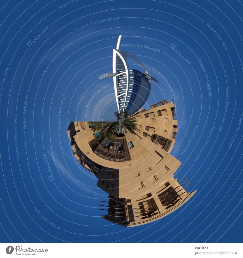 it goes around this world Burj Al-Arab Hotel Dubai little planet tiny world United Arab Emirates Tourism Blue globe Earth Planet High-rise construction boom