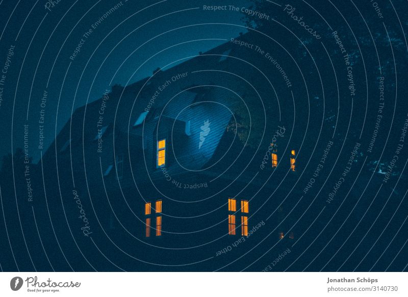dark house at night with illuminated windows somber House (Residential Structure) dwell Night Illuminated Window lit Detached house Apartment house Rent