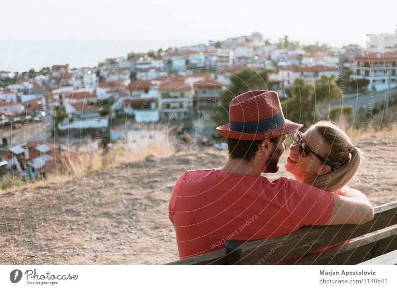 Young couple in love enjoying the view of the town and sunset Lifestyle Joy Leisure and hobbies Vacation & Travel Tourism Summer Summer vacation Valentine's Day