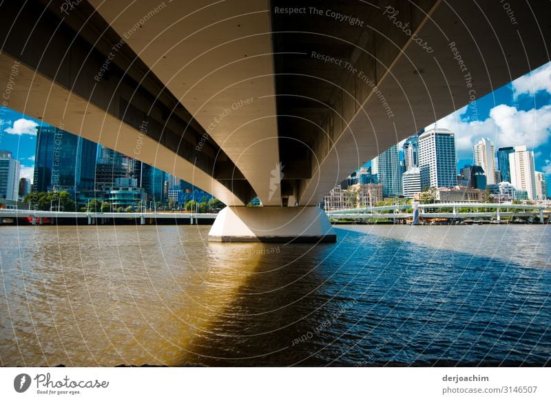 Bridge to Brisbane from below. Water and in the background the skyscrapers. Design Trip Construction site Environment Summer Beautiful weather River bank