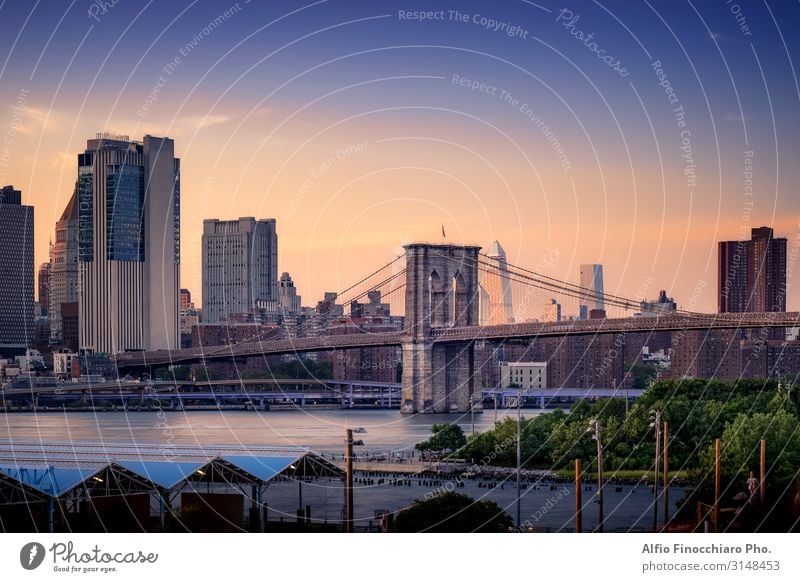 Elevated view of Brooklyn Bridge Vacation & Travel Landscape Sky Sunrise Sunset Summer River Downtown Skyline High-rise Building Architecture Transport New