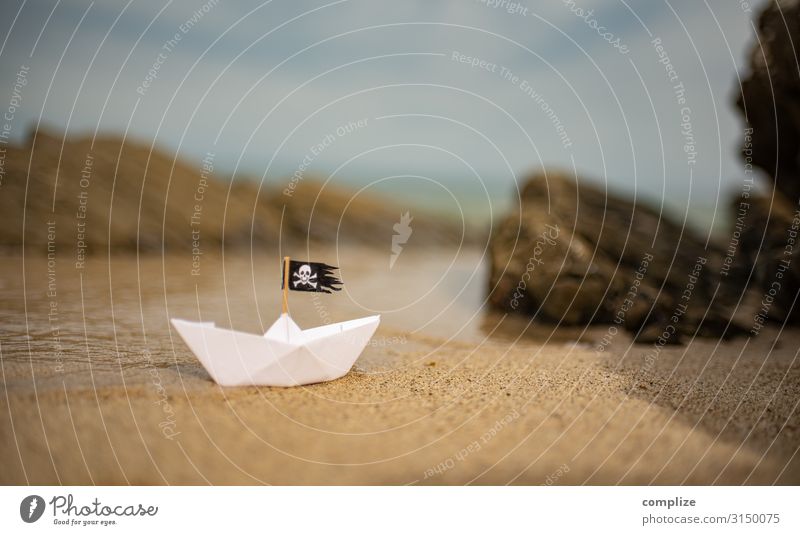 Pirate paper ship on the beach between cliffs Vacation & Travel Adventure Far-off places Expedition Summer Summer vacation Sports Swimming & Bathing Sailing