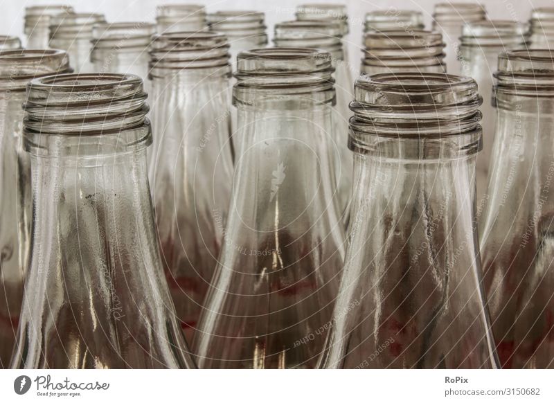 Rows of glass bottles. Food Beverage Bottle Glass Lifestyle Style Design Education Science & Research Work and employment Profession Workplace Factory Economy