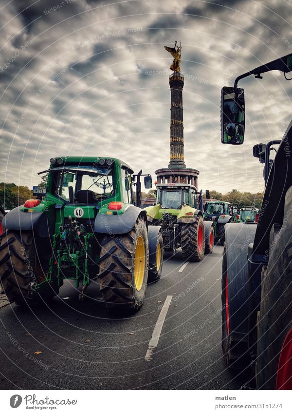 Farmer demo Capital city Downtown Deserted Manmade structures Tourist Attraction Landmark Street Crossroads Tractor Authentic Dark Yellow Gray Green Red