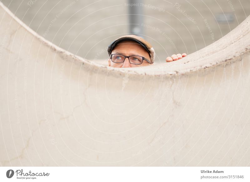 Take cover.... Human being Masculine Man Adults Head Eyes Fingers 1 45 - 60 years Hamburg Wall (barrier) Wall (building) Window Eyeglasses Hat Cap Curiosity