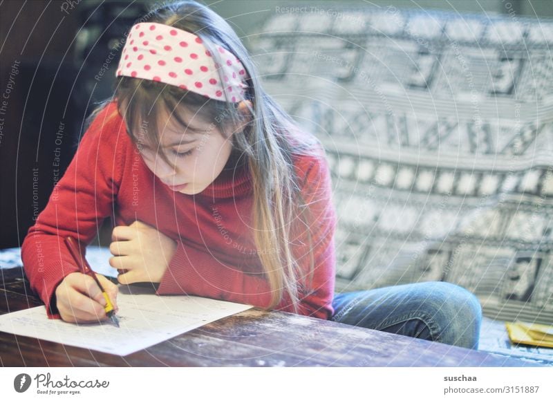 girl does her homework Child Girl at home Homework School Study Education Infancy Interior shot Homeschooling Quarantine Reading Write Schoolchild stay at home