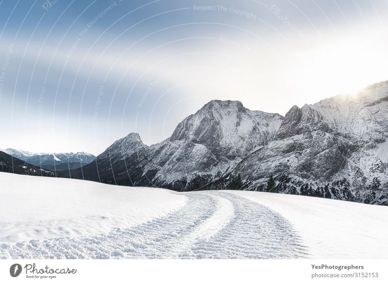 Alpine winter landscape with snowy mountains and snowy road Vacation & Travel Tourism Trip Adventure Freedom Winter Snow Mountain Nature Landscape