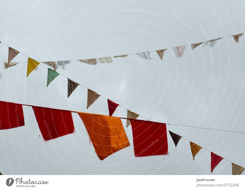 Ensign crisscross Street art Cloudless sky Prenzlauer Berg Decoration Flag Rope Hang Long Many Happiness Creativity Joie de vivre (Vitality) Ease Subdued colour