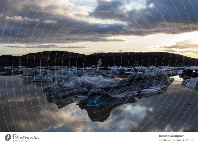 Glacier lake at sunset in Iceland Vacation & Travel Tourism Sightseeing Hiking Environment Nature Landscape Water Climate Frost Snow Cool (slang)