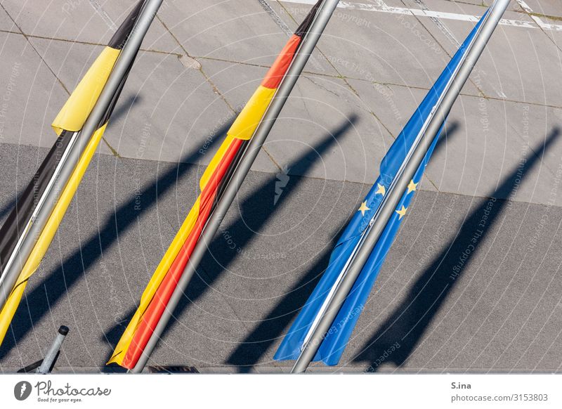 flags Concrete Metal Flag Culture Might Moral Arrangement Flagpole Colour photo Multicoloured Exterior shot Deserted Copy Space right Day Shadow Sunlight