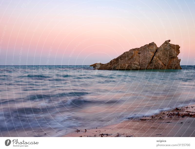 Rock in the surf Swimming & Bathing Sailing Environment Landscape Sand Air Water Cloudless sky Horizon Sunrise Sunset Spring Summer Beautiful weather Waves