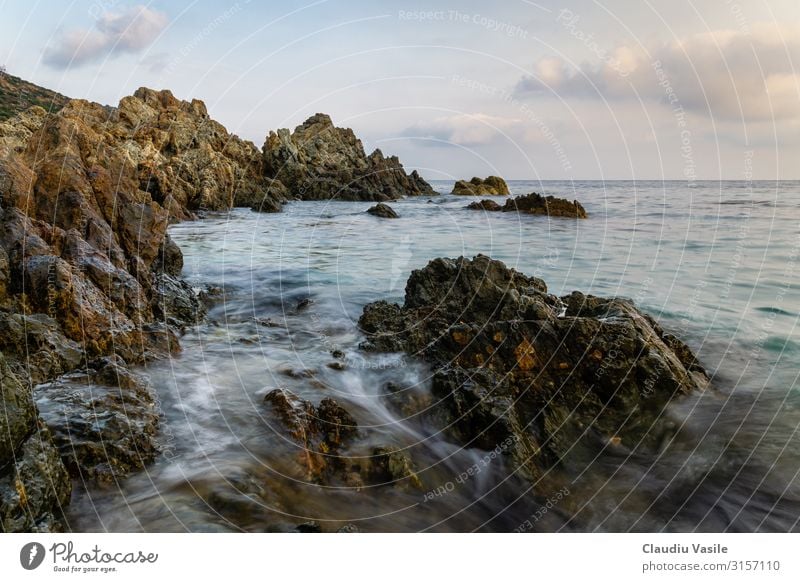 Rocky Shoreline at Cap Taillat Nature Landscape Water cap taillat St.Tropez ramatuelle Mediterranean sea Famousness Sharp-edged Beach Flow Clouds Colour photo