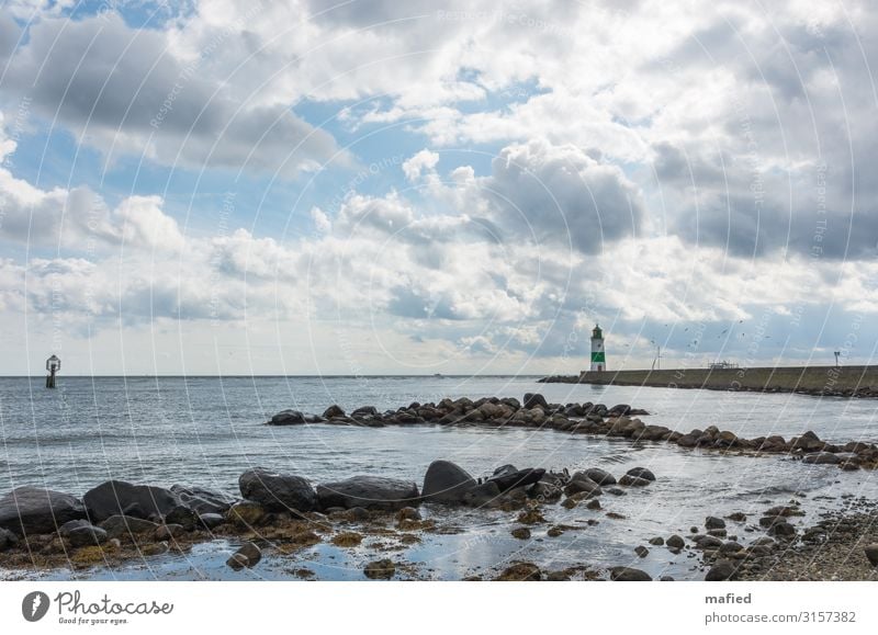 mucous Landscape Water Sky Clouds Autumn Beautiful weather Wind Coast Beach Baltic Sea Lighthouse Landmark Navigation Boating trip Fishing boat Sailboat Stone