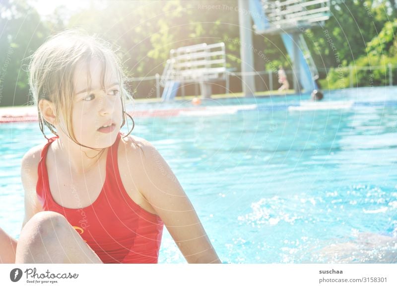 child in swimming pool Child girl Swimming pool swimmer pool Water basin refreshingly Summer Hot Swimsuit Springboard Bright sunshine Relaxation