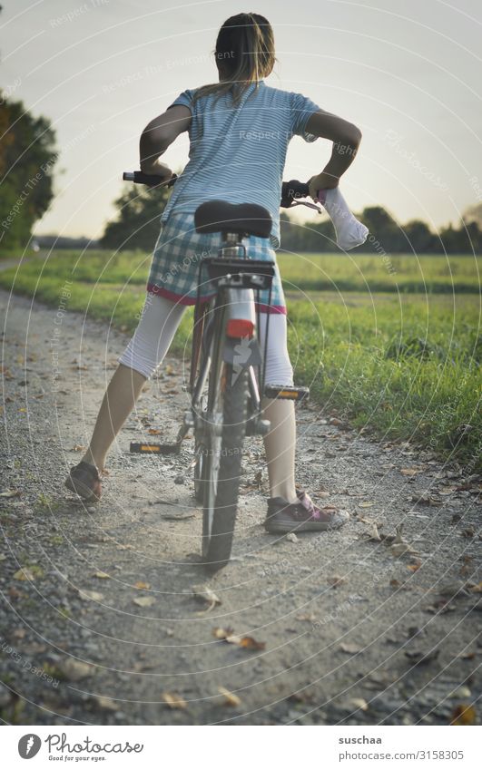 cyclist Bicycle Cycling Cycling tour Child Girl Trip Autumn autumn excursion Go up Driving Nature Exterior shot Infancy Lanes & trails Footpath Field