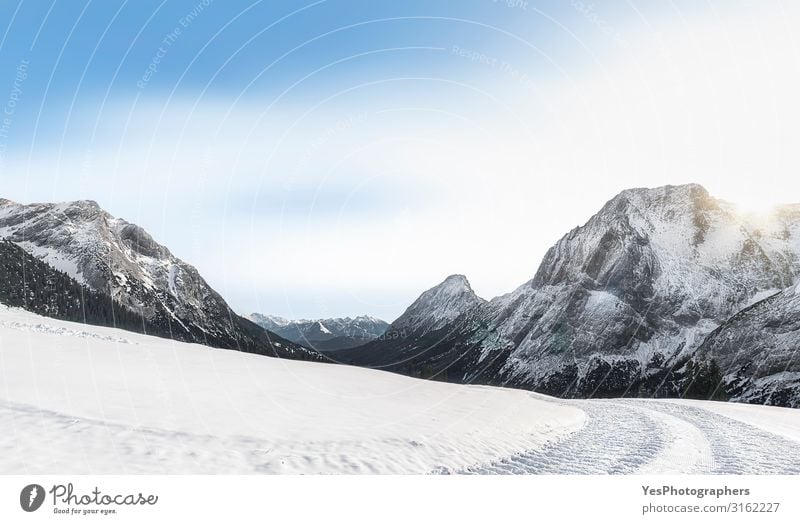 Snow-covered mountains and snowy nature. Winter landscape Sun Mountain Nature Landscape Climate change Weather Beautiful weather Alps Peak Street Bright White