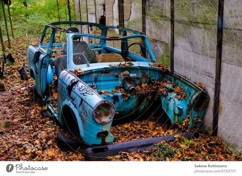 Trabant Vehicle Car Trabbi Old Dirty Broken Blue Senior citizen Town Decline Past Transience Change Autumn Colour photo Exterior shot Deserted Day