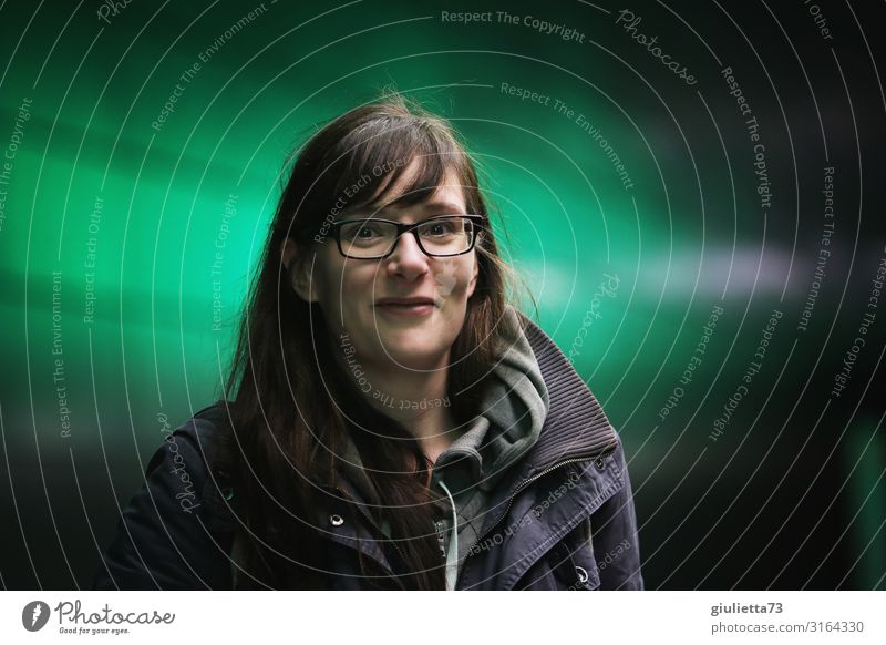 Young woman in the underground station HafenCity in Hamburg Youth (Young adults) Woman Adults Life 1 Human being 30 - 45 years Eyeglasses brunette Long-haired