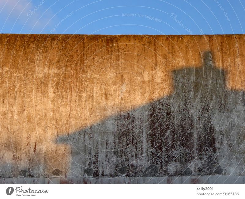 romantic concrete Wall (building) Facade Shadow shadow cast Concrete Gray evening light Twilight Old Contrast built windowless Wall (barrier) Weathered