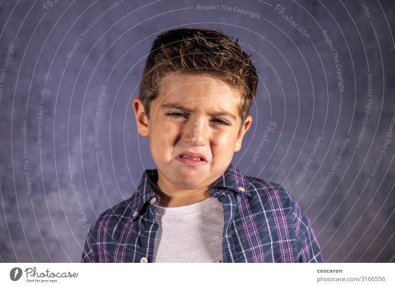 Little boy sad crying isolated in blue Beautiful Face Parenting Child School Classroom Schoolchild Human being Masculine Baby Toddler Boy (child) Man Adults