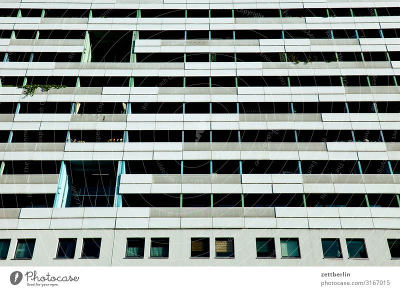 Living in a skyscraper Architecture House (Residential Structure) Apartment Building Tower block High-rise Story Flower Plant Balcony Flowerpot Deserted