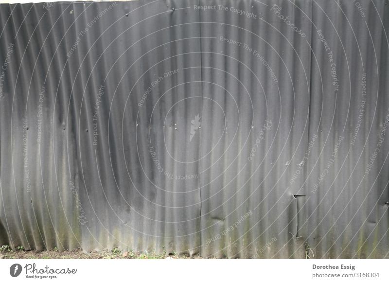 sheet metal Garden plot Outskirts Metal Line Fence Hideous Gray Colour photo Subdued colour Exterior shot Close-up Structures and shapes Deserted Day