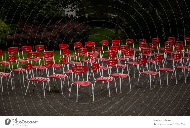 Corona sends its regards: numerous unoccupied chairs in the park coronavirus Red unmanned out Empty Seating Deserted Loneliness Gastronomy Places Free Furniture