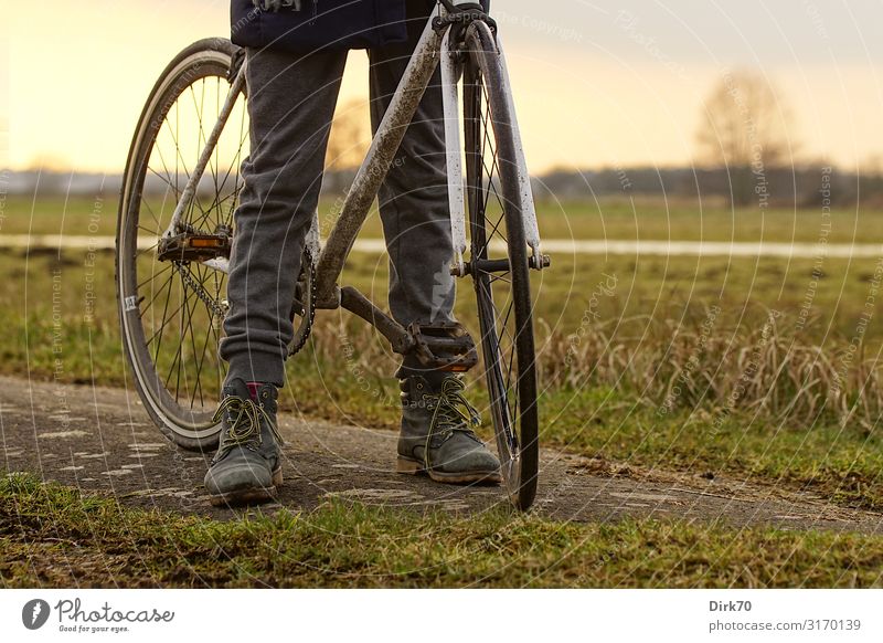 Cycling on dirt roads. Leisure and hobbies Trip Cycling tour Girl Infancy Youth (Young adults) Legs 1 Human being 8 - 13 years Child Nature Landscape Autumn