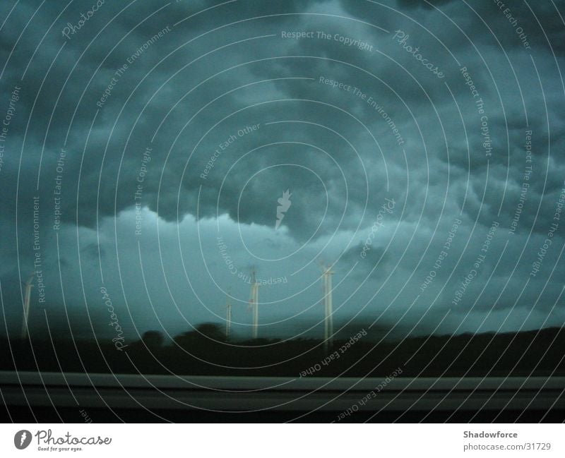 Storm front I Gale Clouds Dark Highway Gray Threat Thunder and lightning Rain Wind energy plant Sky