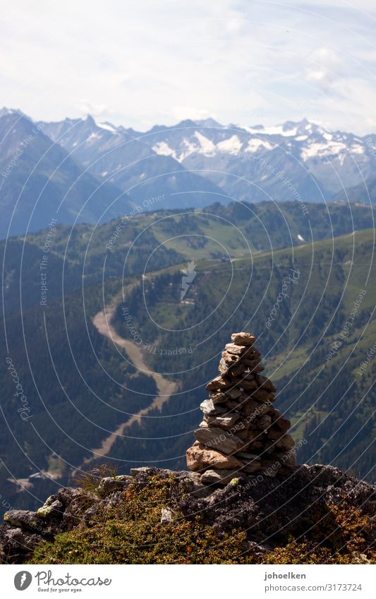 Cairns in front of an alpine panorama Alps Mountain Sky Deserted Copy Space Zillertaler Alps mountain panorama Panorama (View) Stoamannl Snowcapped peak Peak