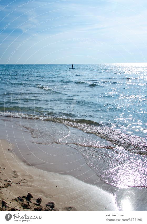 Girl on a sup in the shore of Torre San Giovanni Vacation & Travel Tourism Beach Ocean Human being Nature Landscape Sky Coast Blue Sunset paddleboard girl