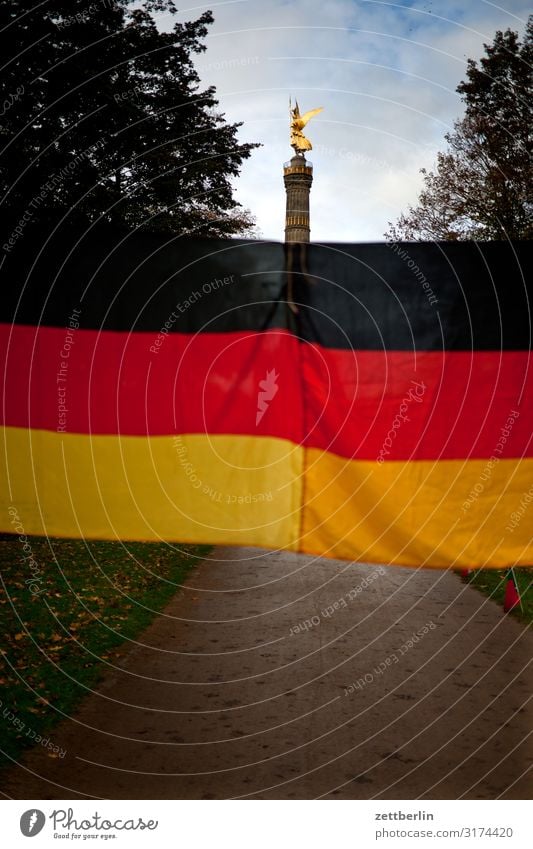 Victory Column and German Flag Berlin zoo Evening Tree Monument Germany Twilight else Closing time Figure Gold Goldelse victory statue big star Capital city Sky