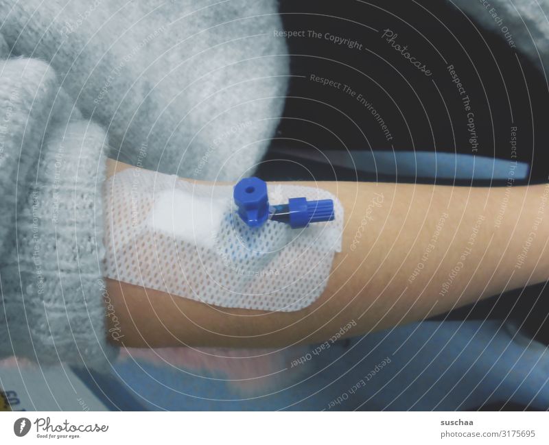 indwelling venous cannula on the arm of a teenager medical treatment Indwelling venous cannula Vein cannula vein access Doctor Hospital Emergency doctor