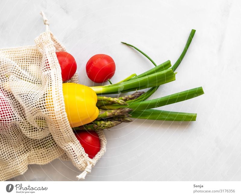 Fresh colourful vegetables in a shopping net Food Vegetable Leek vegetable Tomato Pepper Asparagus Nutrition Organic produce Vegetarian diet Diet Fasting