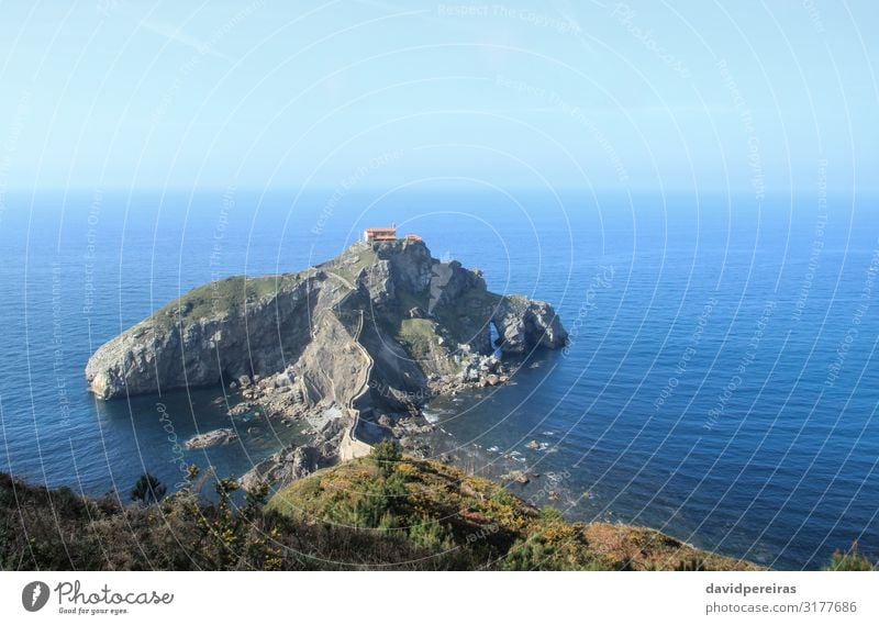 Panoramic view of San Juan de Gaztelugatxe islet Vacation & Travel Tourism Beach Ocean Island Mountain Nature Landscape Sky Hill Rock Coast Church Bridge Street