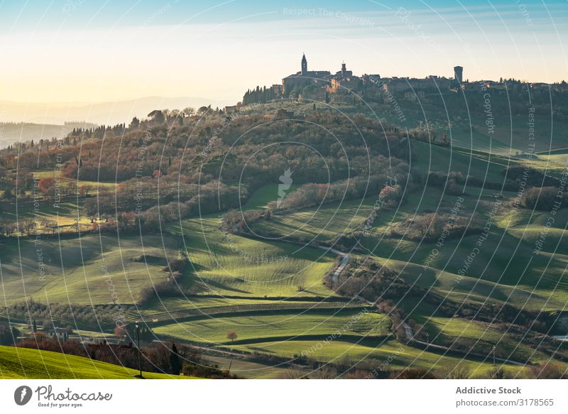 Majestic green valley with town on top Valley Highlands Town Tuscany Italy Rural Landscape Nature Beautiful Tourism Panorama (Format) Summer Mountain