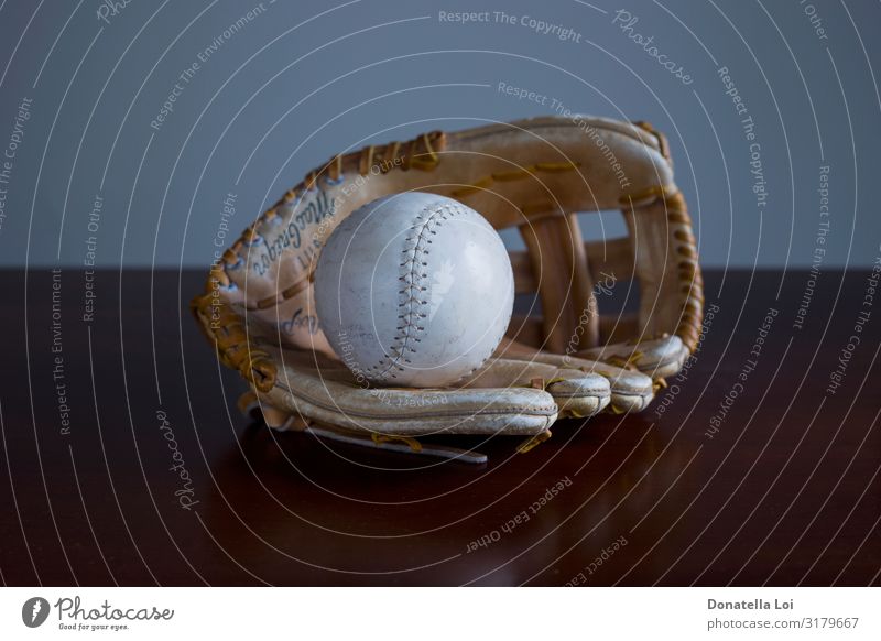 Vintage baseball glove on the table Playing Table Sports Ball sports Old Retro Brown White Infancy American Antique conceptual equipment Object photography