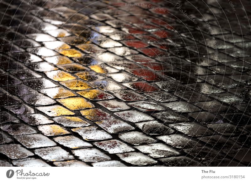 Cobblestone pavement in new splendour Old town Pedestrian precinct Deserted Street Cobblestones Paving stone Dark Glittering Yellow Red Black White