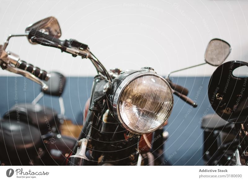 Retro motorcycles in garage Motorcycle Garage Repair headlights Broken Parked Service Workshop Mechanic Transport Equipment Vehicle Vintage Shabby Weathered