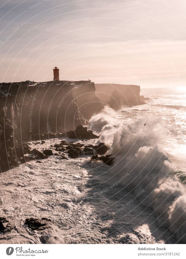 Landscape of lighthouse in Iceland Beacon Lighthouse Svörtuloft seaside Ocean Tower Coast Navigation Landmark Nautical Maritime Signal searchlight