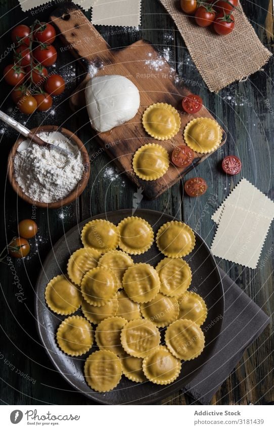 Homemade ravioli made with parmesan cheese, tomato and basil. Ravioli Dish White Sauce Kitchen Green Lunch Top Pasta Rustic Food Gourmet Ricotta Tomato