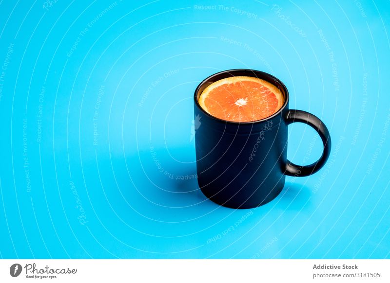 Mug with fresh citrus Breakfast Conceptual design Drinking Slice Morning Juicy Cut Grapefruit Orange Piece Fresh Raw Mature Vegan diet Energy Healthy Fruit