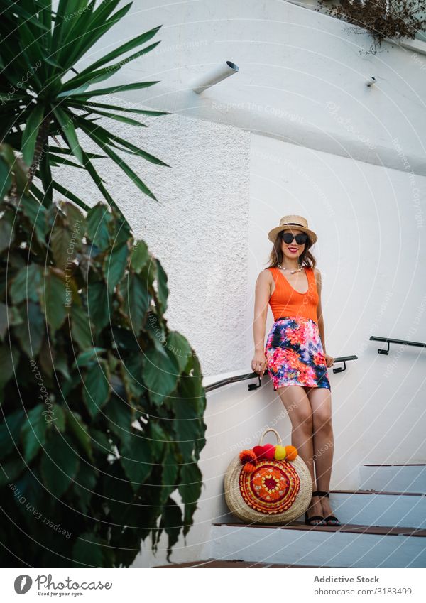 young elegant chinese woman at mediterranean scenario Elegant Chinese Woman wealthy Panama hat Beauty Photography Sit Stairs Leaf Attractive Lady Adults Natural