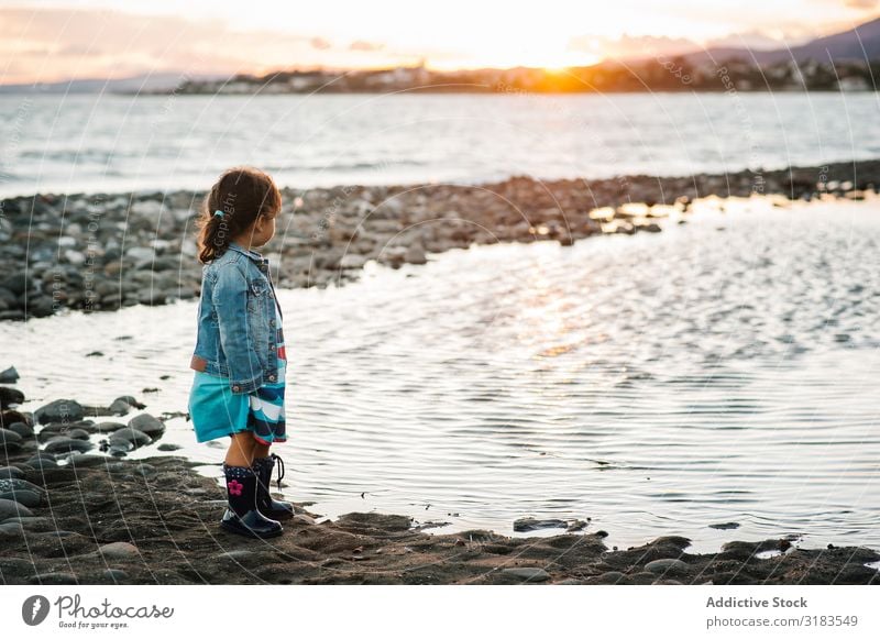 small girl by the beach Girl Child Beach Sunset Silhouette Stand Ocean Freedom Summer Lifestyle Vacation & Travel Human being Joy Happiness Love