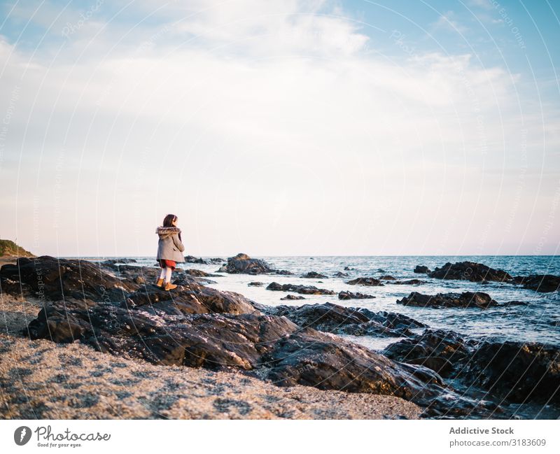 back view of little girl looking at sea Beach Girl Vantage point Looking Freedom Ocean Back Small Delightful Summer Stand Child Sand Water Vacation & Travel