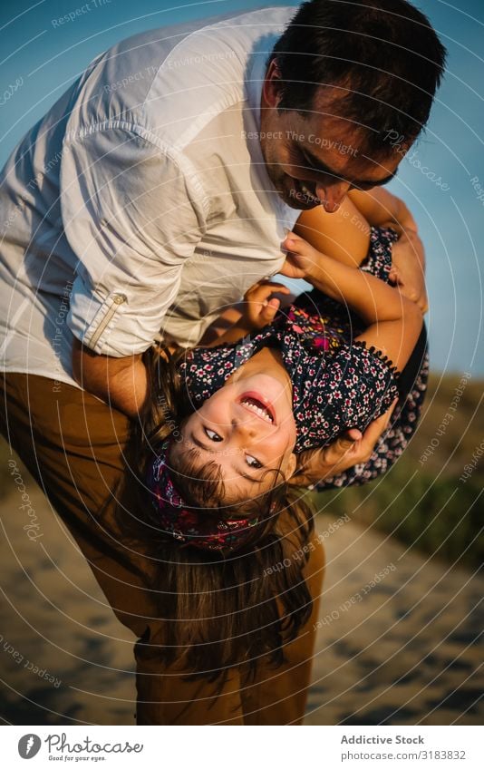 Father holding daughter Child Hold Daughter Beach seaside Sand Vacation & Travel Ocean Summer Water Together Coast Nature Landscape Tourism Beautiful